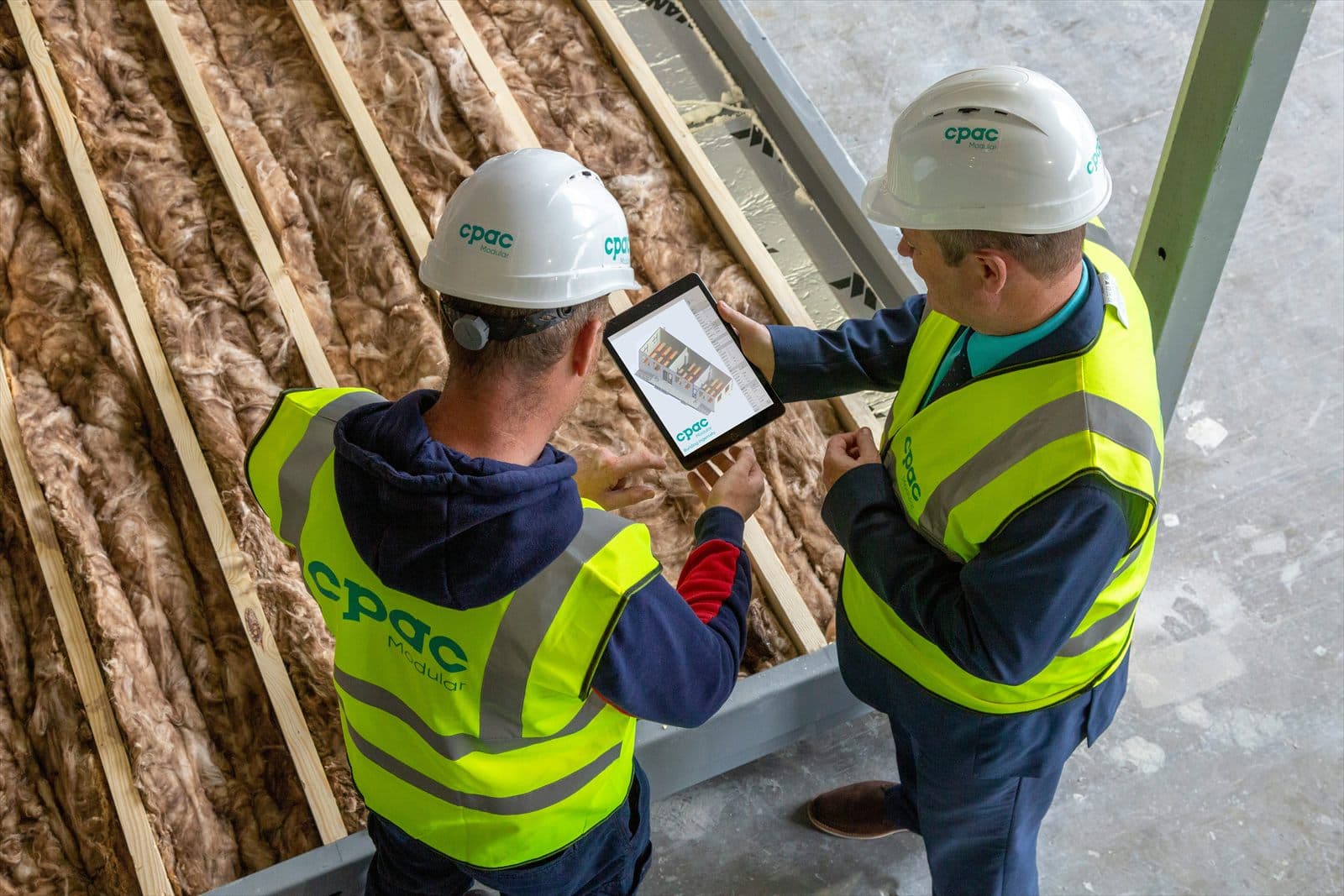 Inspectors reviewing a building under construction